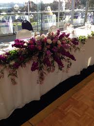 Pin On Wedding Flowers Reception Table Centrepieces And Bridal Head Table
