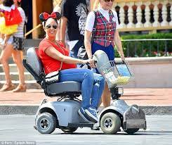 Heavily Pregnant Tamera Mowry Uses Electric Scooter At Disneyland Disney World Theme Parks Disney World Disney World Magic Kingdom