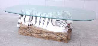 The detail of the tiger was fine and the size was perfect for my little living room with just one couch and 1 chair. Lot White Tiger Cub Coffee Table