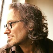 What harmonica keys are essential to carry for blues and Americana music?