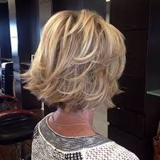 This asymmetrical short hairstyle has been styled off the face and then curled with large hot rollers to create a large wave in the front. 30 Simple Short Hairstyles For Women Over 50 The360report