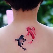 Colorful tattoos tend to hurt more because it has to be etched on a bigger portion of your skin like the arm.it has nothing to do with the shades, a common myth aspiring people think, but more of like how the color will be spread on the surface. 16 Lovely Little Fish Tattoos Koi Fish Tattoo Koi Tattoo Mermaid Tattoos