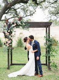 Wooden Wedding Ceremony Arch Wooden Arch With Elegant Greenery And Floral Arrangements Ou Wedding Arches Outdoors Wedding Ceremony Arch Wedding Arch Rustic