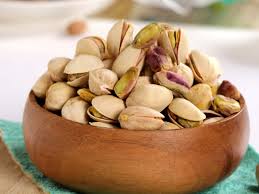 Shelled and unshelled pistachios (pistacia vera). Weight Loss Add Pistachios To Your Breakfast To Burn Fat And Shed Kilos The Times Of India