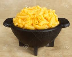 Turn out into a generously buttered casserole bake in a preheated 350 degree fahrenheit oven for approximately 20 minutes or until heated all the way through and golden brown on top. Closeup Bowl Of Macaroni And Cheese In A Black Bowl Stock Photo Picture And Royalty Free Image Image 8287289