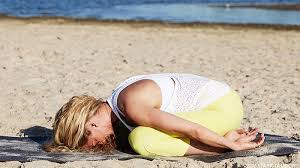 Colleen Saidman Yee Performs Modified Child S Pose Yoga Postures Yoga Sequence For Beginners Yoga Benefits