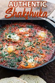 Shakshuka Recipe This Is A Delicious Blend Of Peppers Onions And Tomatoes That Are Stewed Down A In 2020 Shakshuka Shakshuka Recipes Clean Eating Vegetarian Recipes