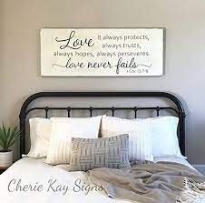 It is fun and filled with personality without being overpowering, which is exactly what you want if you are trying to achieve a contemporary look to your master bedroom. Wood Sign Plaque Master Bedroom Wall Decor Love Never Fails 1 Corinthians 13 Wood Sign Rustic Bedroom Decor Farmhouse Bedroom 24 X 9 2 Amazon Ca Home