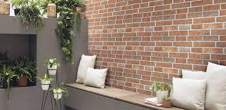 The white wall also accentuates the plant's vivid green color. Brick Wall Tiles Kajaria India S No 1 Tile Company