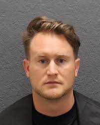 Seneca man charged with hitting woman with protection order