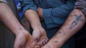 Applying the cross (on your wrist) one of the distinctive marks of a coptic christian is the cross tattoo worn on the wrist. State Of Fear Egypt S Copts In Peril The World From Prx
