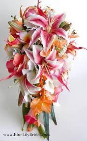 Well you're in luck, because here they come. Stargazer Cascade Bridal Bouquet In Hot Pink And Orange Etsy Bridal Bouquet Cascading Bridal Bouquets Beach Wedding Bouquets
