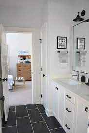 No grain of the wood showing, white tops, grey bottoms. Painting Bathroom Cabinets A Beginner S Guide Chrissy Marie Blog