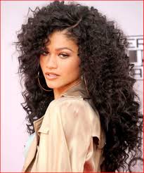 Many black celebrities rock relaxed black locks these days, because relaxed hair looks breathtaking in any simple or sophisticated hairstyle. Curly Long Hair Natural