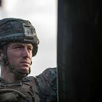 U.S. Marine Cpl. Christian Salvaggio looks out of an