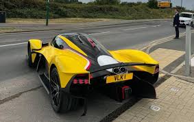 Image result for Sunburst Yellow 2017 Aston Martin