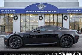 Image result for Jet Black 2010 Aston Martin