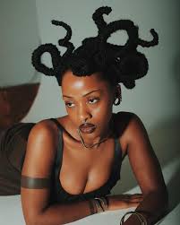 channeling an otherworldly essence, the intricate hair design transforms  this look into a surreal masterpiece • photographer: @ryan.wimsatt stylist:  @daissydreams