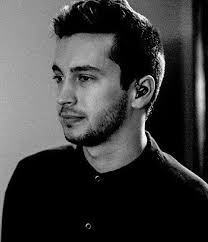 tyler joseph with a beard/scruff