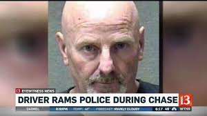 Driver rams police during pursuit
