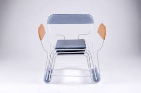 The legs are metal with wooden transfer printing. This Armchair Is Actually Made Up Of 3 Separate Chairs Stacked Together Yanko Design
