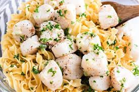Buttery Air Fryer Scallops Become Tender And Delicious In Your Ninja Foodi Or Cosori Great Served On Rice Or In A Bed Of Bu In 2021 Scallop Recipes Recipes Easy Meals