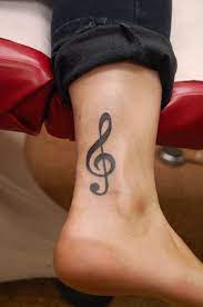 Kirk Edward Nilsen Ii Custom Tattoos July 2010 Treble Clef Tattoo Clef Tattoo Tattoo Designs Wrist