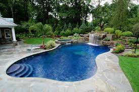 Pool landscaping and landscaping around your pool is very important. Allendale Nj Tropical Inground Swimming Pool Landscape Nj Kolonialstil Pools New York Von Cipriano Landscape Design Custom Swimming Pools Houzz