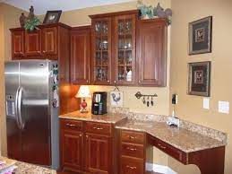 French country kitchens, in particular, make us feel some kind of way. French Country Kitchen With Loads Of Color Cherry Wood Kitchen Cabinets Kitchen Colors Kitchen Paint