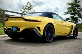 Image result for Cosmopolitan Yellow 2023 Aston Martin