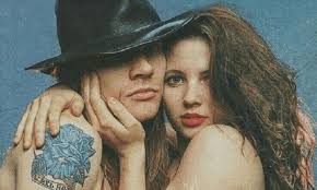 Behind his back is his wife or girlfriend doing chores around the house. Erin Everly The Complete Story Of Axl Rose S First Wife Rocks Off Mag