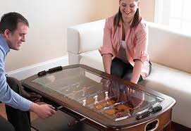 It has traditional bead scoring to keep track of the action, steel rods, solid wood handgrips, and leg levelers for easy. Foosball Coffee Table Sharper Image