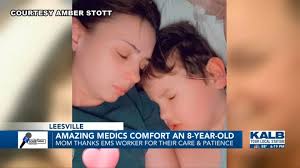 Eight-year-old receives comfort from two "amazing" EMS workers