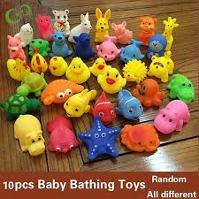 I filled up the tub, added bleach, and let the bath toys (and the bath mat, and cup, and bath toy basket, etc.) soak for a while. 10pcs Set Cute Baby Bath Toys Wash Play Animals Soft Rubber Float Sqeeze Sound Toys For Baby Gyh Review Baby Bath Toys Bath Toys Baby Bath