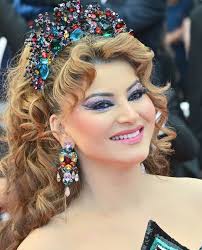 Urvashi really said “go big or go bird!” From feathers to crystals, she  pulled up to #Cannes2025 looking like a couture parrot in the best way  possible. That green gown? Extra. That