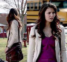 Elena S White Leather Jacket And Burgundy Satchel On The Vampire Diaries Vampire Diaries Outfits White Leather Jacket Vampire Diaries Fashion