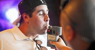 Police give breath tests to bar patrons to fight DUIs