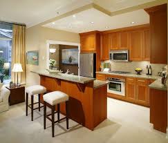 You may consider adding a drop down table at the back of an existing bar for creating extra dining space. Small Kitchen Bar Ideas Pics Browse