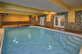 Having a private pool within your own cabin means that you can swim and take a dip any time of day or night with absolute privacy. Indoor Pool Lodge 8 Bedroom Black Bear Ridge Cabin Near Pigeon Forge