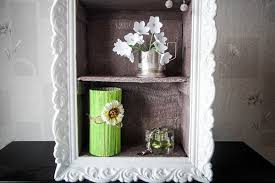 Cardboard box pieces, papier mache clay(check link below) aluminium foil, sandpaper, glue, pearl white and golden metallic acrylic colors. Cheap Diy Home Decor Idea Decorative Cardboard Wall Shelf