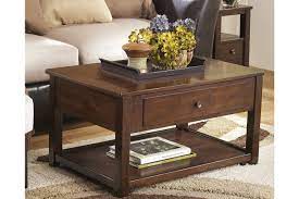 Casters give you the option of added mobility. Marion Coffee Table With Lift Top Ashley Furniture Homestore