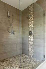 Welcome to our gallery of pebble tile shower floor design ideas including popular types, installation & cleaning tips. 13 Best Pebble Tile Shower Floor Ideas Bathrooms Remodel Bathroom Design Bathroom Makeover