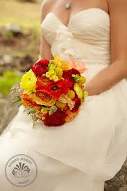 Artificial wedding flowers we purchase in large volume to pass the savings on to you. Red Orange And Yellow Wedding Bouquet