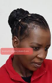 So you want to leave out hair around the edges, so that she can so we're going to part out hair to make our braid, zll the way to the center for this side. 34 Wool Style Ideas African Hairstyles Natural Hair Styles Hair Styles