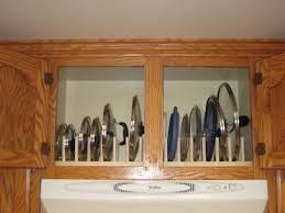 Diy Pot And Pan Lid Cupboard Rack Smart To Put Them Up Top Where They Are Out Of The Way Kitchen Organization Diy Diy Kitchen Cabinets Diy Kitchen Storage
