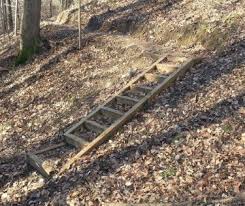 Construct a spillway for the drain to protect the adjacent fill from erosion. Jimmy Nash Trail Hoosier Hikers Council