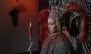 Roger moore as james bond with jane seymour as solitaire in live and let die (1973). Jane Seymour Solitaire For The James Bond Film Live And Let Die Costume Cafleurebon Perfume Blog