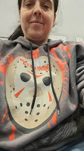 Jason is wearing a beige leather jacket. His style is often described as a  combination of casual pieces and bold accessories that emphasize his  confidence and individuality.