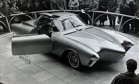 We see two cadillac concept cars driving around: The Greatest Concept Cars Of The 1950s