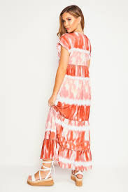 Nos robes longueur midi sont faites pour vous. Robe Longue Fluide Tie Dye Marron Brentiny Paris